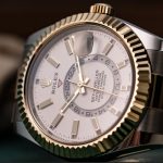 The 42 mm fake watches have white dials.
