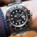The black dial replica watch is designed for men.