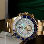 The 18ct gold fake watch has a white dial.